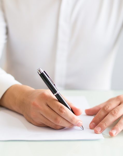 Professional reviewing documents for Freezone Company Formation in Dubai, UAE