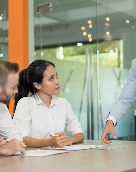 Business team discussing mainland company formation in Dubai, UAE in a modern office