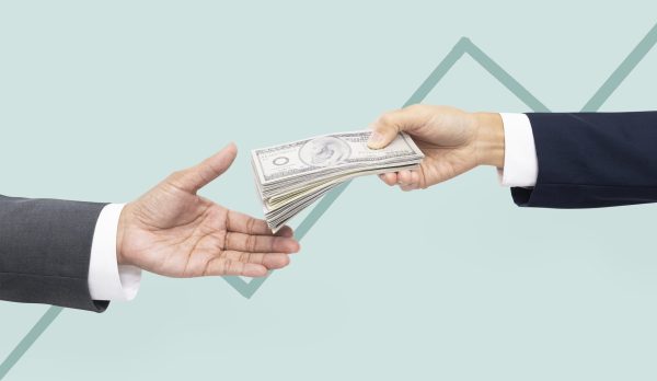 Business proposal purchase hands holding money UAE salary payment regulation